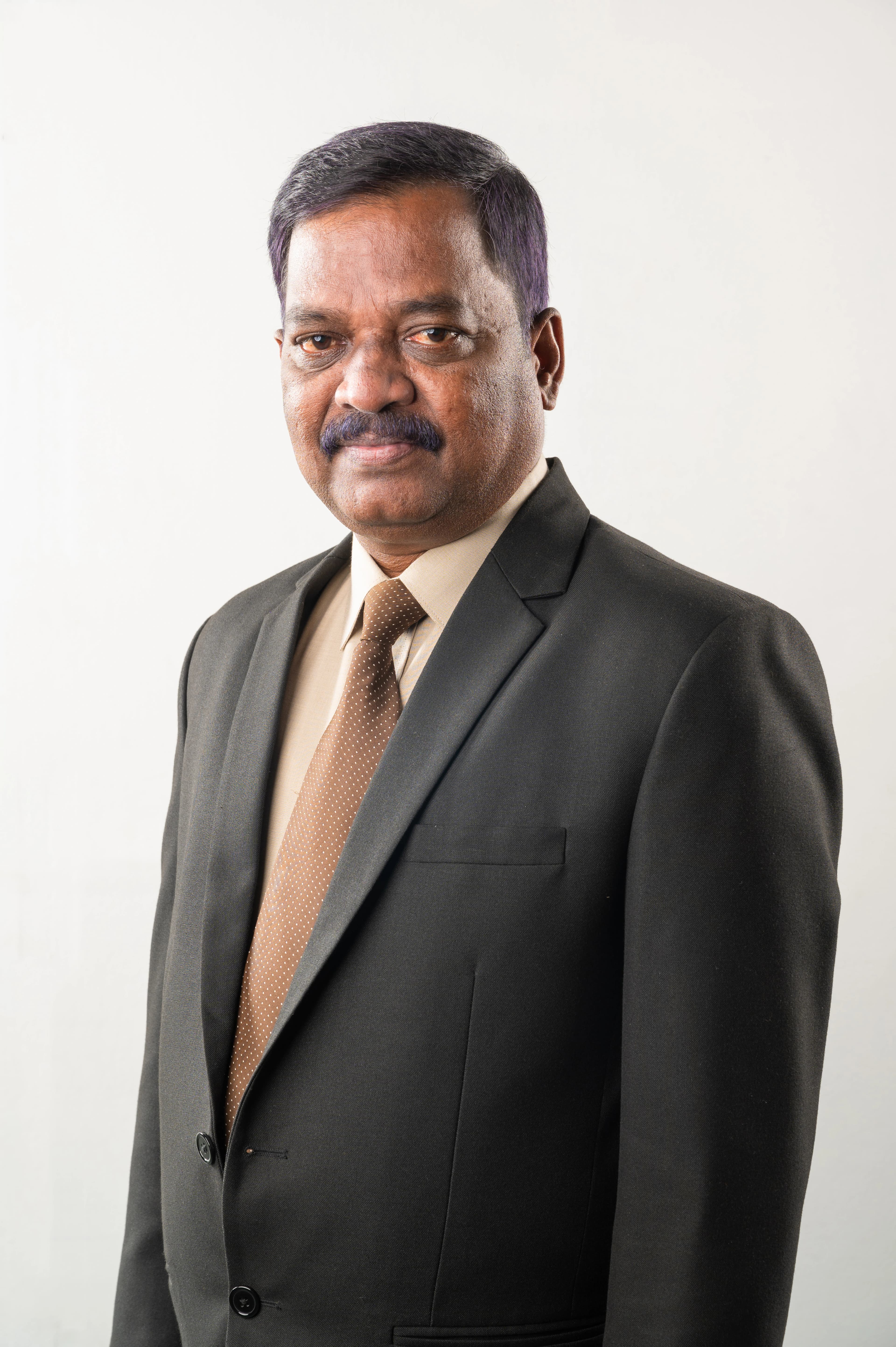 Dr. B. Gunalan